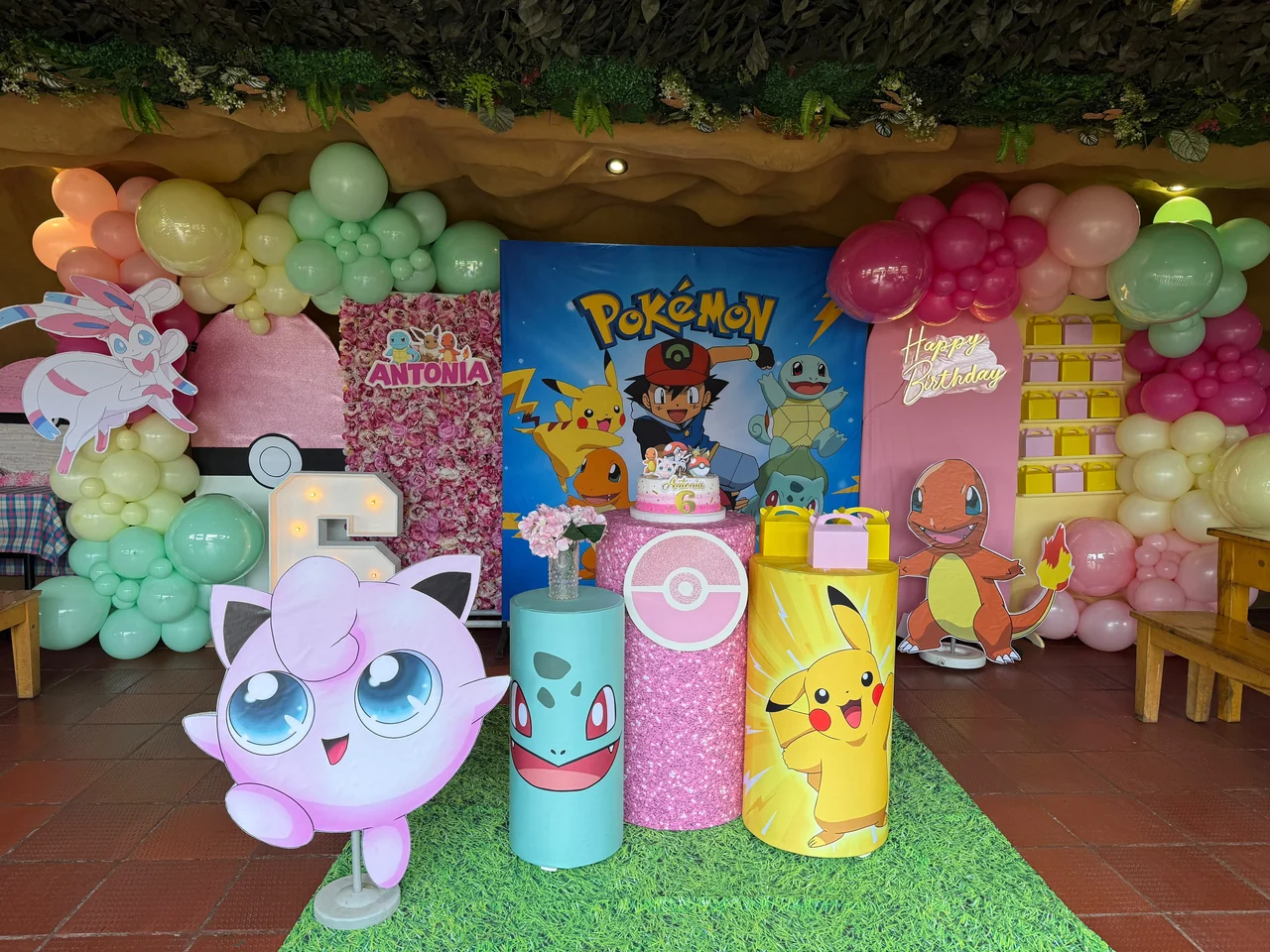 Pokémon birthday decorations with colourful balloons