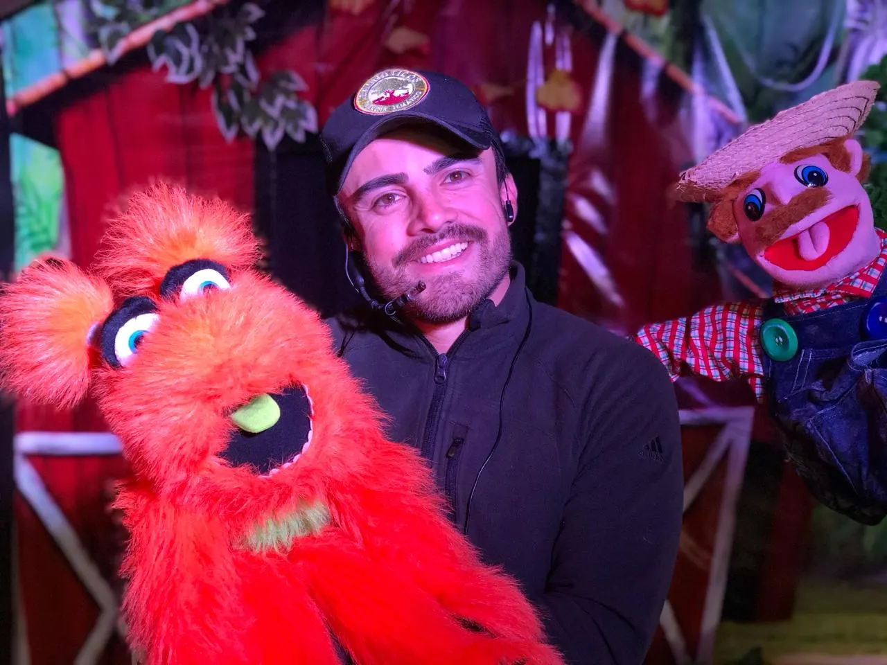 Performer with puppets at the Puppet show
